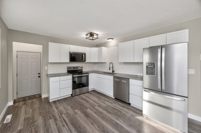 303 W McKinney Street, Runnells, IA 50237