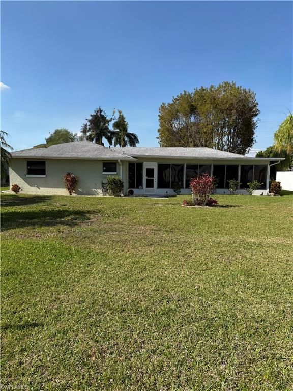 Image 6 of property listing at 2216 SE 3rd ST, Cape Coral, FL 33990