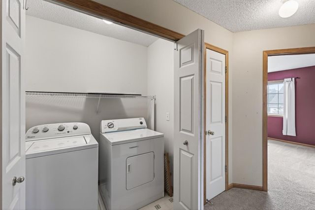 8639 Quarry Ridge Lane I, Woodbury, MN 55125