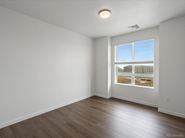6153 N Ceylon Street 304, Denver, CO 80249