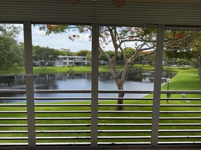 4261 W Palm Aire Drive 202, Pompano Beach, FL 33069