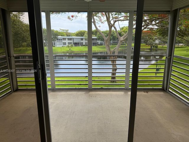 4261 W Palm Aire Drive 202, Pompano Beach, FL 33069