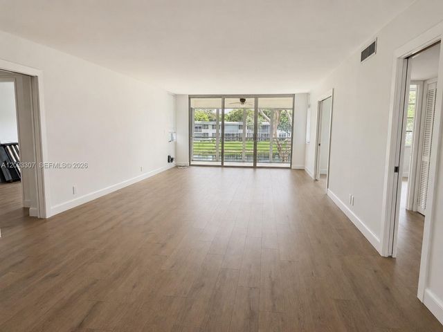 4261 W Palm Aire Drive 202, Pompano Beach, FL 33069