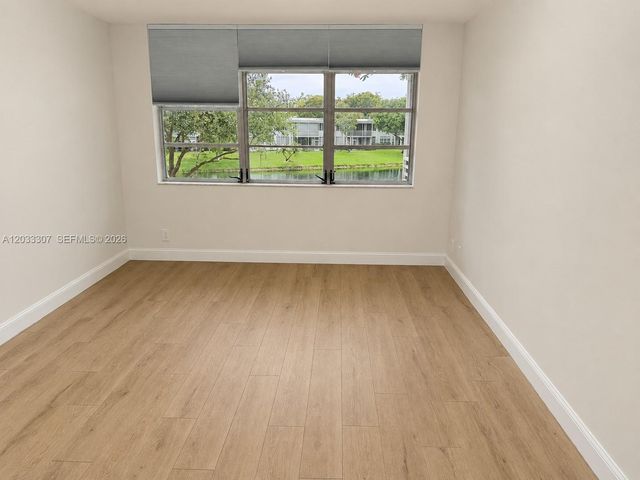 4261 W Palm Aire Drive 202, Pompano Beach, FL 33069