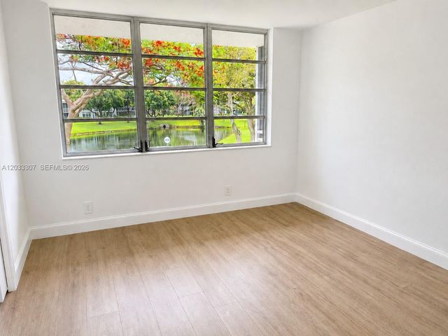 4261 W Palm Aire Drive 202, Pompano Beach, FL 33069