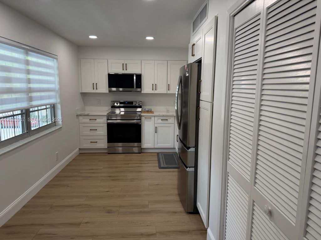 4261 W Palm Aire Drive 202, Pompano Beach, FL 33069