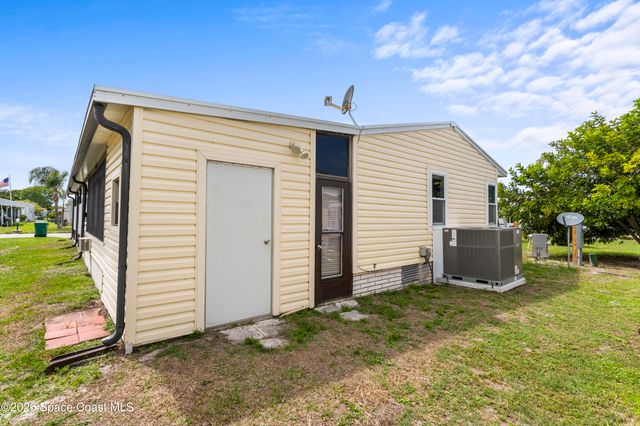 624 Wedelia Drive, Barefoot Bay, FL 32976