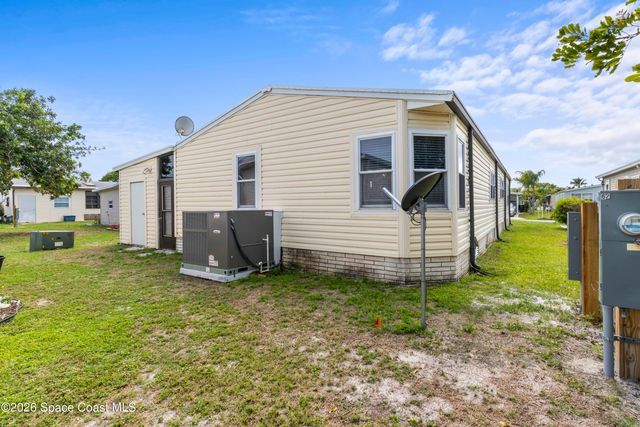 624 Wedelia Drive, Barefoot Bay, FL 32976