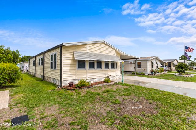 624 Wedelia Drive, Barefoot Bay, FL 32976