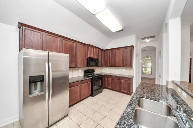 14618 Stablebrook Drive, Beach City, TX 77523
