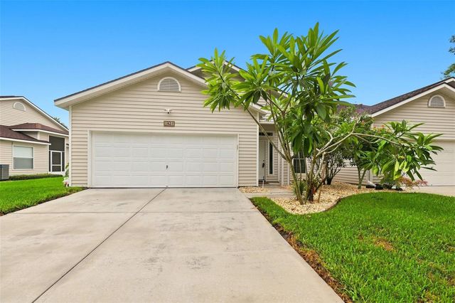 1821 LAKE HERON DRIVE, Lutz, FL 33549