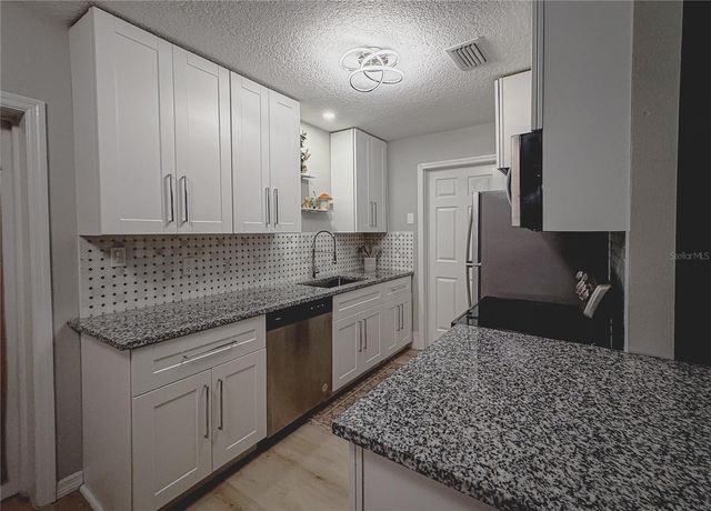 7413 LAKESHORE DRIVE, Tampa, FL 33604