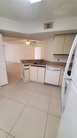 9055 Wiles Rd 103, Coral Springs, FL 33067