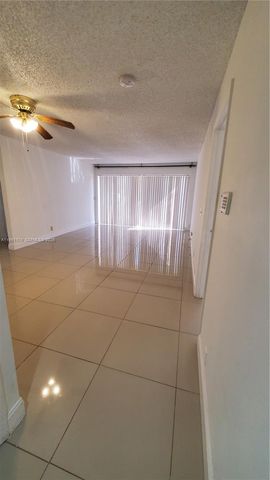 9055 Wiles Rd 103, Coral Springs, FL 33067