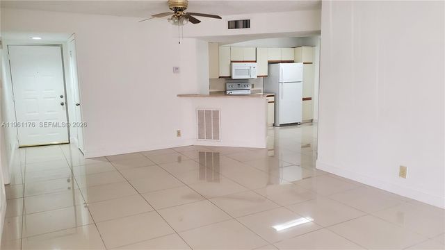 9055 Wiles Rd 103, Coral Springs, FL 33067