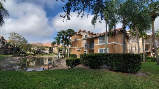 9055 Wiles Rd 103, Coral Springs, FL 33067