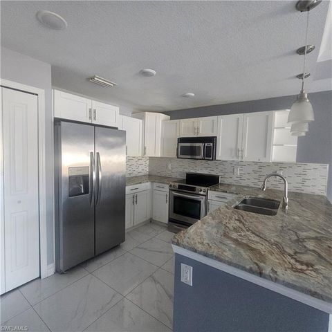 131 Gilbert AVE S, Lehigh Acres, FL 33973