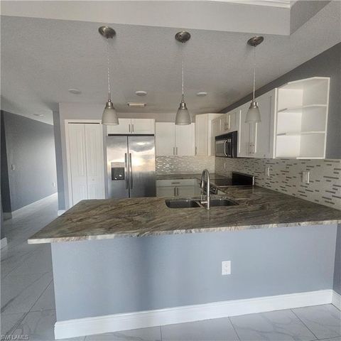 131 Gilbert AVE S, Lehigh Acres, FL 33973