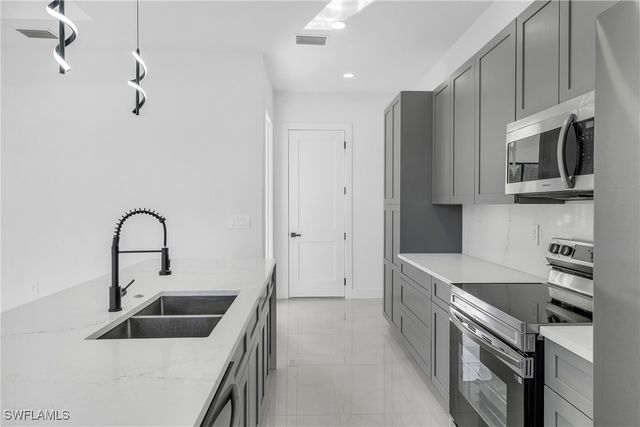 3409 24th ST SW, Lehigh Acres, FL 33976