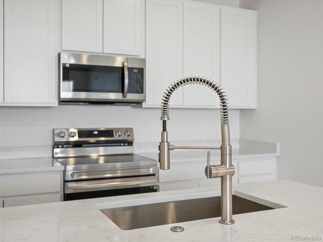 6153 N Ceylon St 3-307, Denver, CO 80249