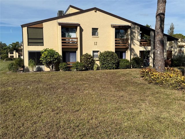 12 QUAILS RUN BOULEVARD 7, Englewood, FL 34223