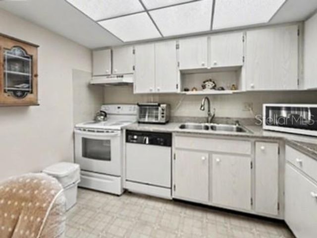 12 QUAILS RUN BOULEVARD 7, Englewood, FL 34223