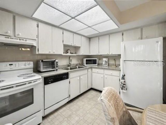 12 QUAILS RUN BOULEVARD 7, Englewood, FL 34223