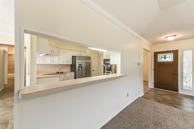 105 W Wildwinn Drive, Alvin, TX 77511