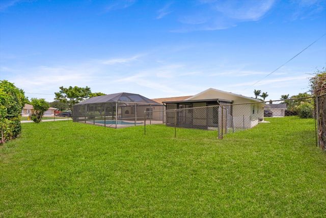 6873 S PLYMOUTH Drive S, Lake Worth, FL 33462