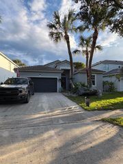 216 Seminole Lakes Drive, Royal Palm Beach, FL 33411