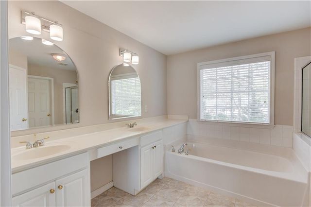 1840 Embassy Walk Lane, Lilburn, GA 30047