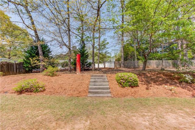 1840 Embassy Walk Lane, Lilburn, GA 30047