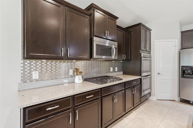 24511 Emerald Pool Falls Drive, Tomball, TX 77375