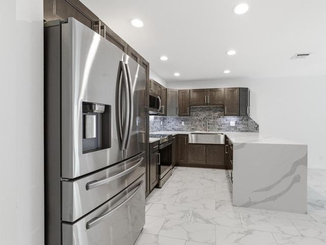 12155 Cuddington Court, Wellington, FL 33414