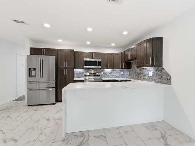 12155 Cuddington Court, Wellington, FL 33414