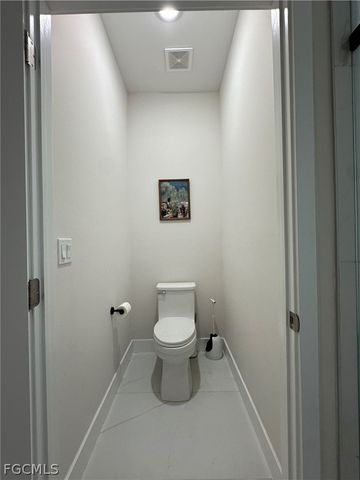 1613 N Gator CIR, Cape Coral, FL 33909