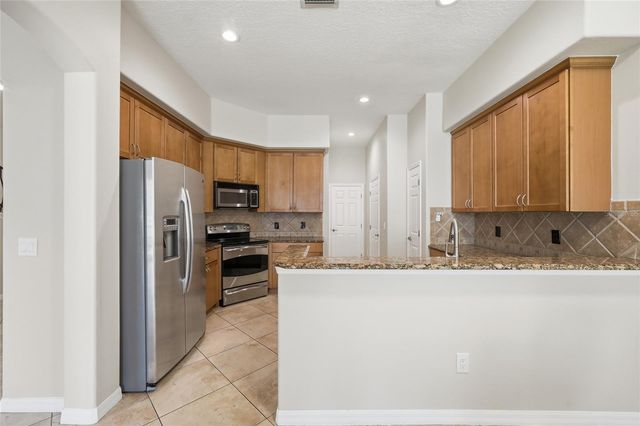 8718 THE ESPLANADE 14, Orlando, FL 32836