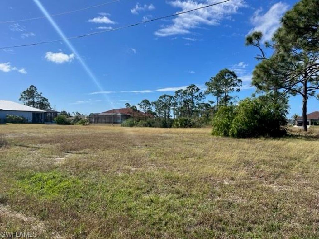 1720 Jacaranda PKWY W, CAPE CORAL, FL 33993 — photo 2