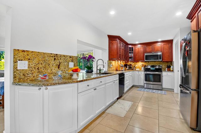 435 Pine Villa Drive, Atlantis, FL 33462