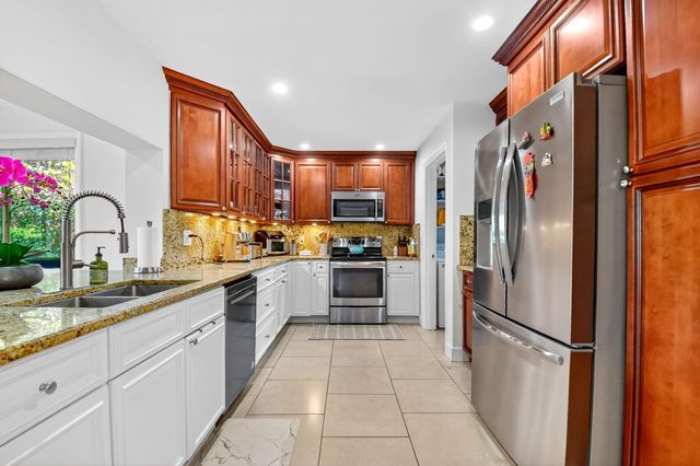 435 Pine Villa Drive, Atlantis, FL 33462