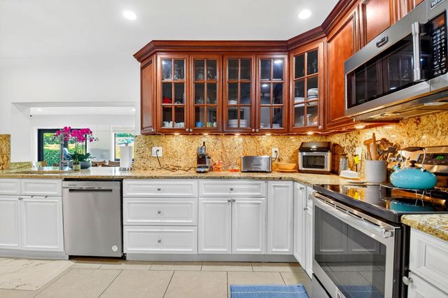 435 Pine Villa Drive, Atlantis, FL 33462