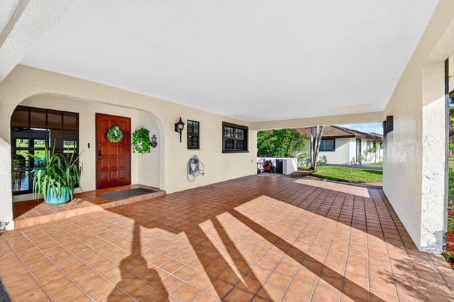 435 Pine Villa Drive, Atlantis, FL 33462