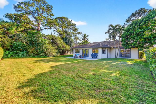 435 Pine Villa Drive, Atlantis, FL 33462