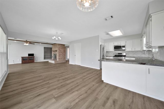 9898 Twin Shores Drive, Willis, TX 77318