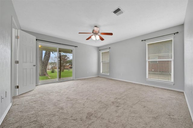 9898 Twin Shores Drive, Willis, TX 77318