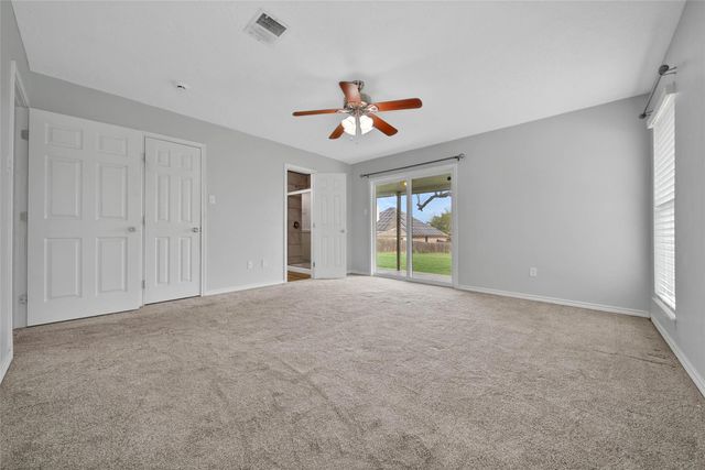 9898 Twin Shores Drive, Willis, TX 77318