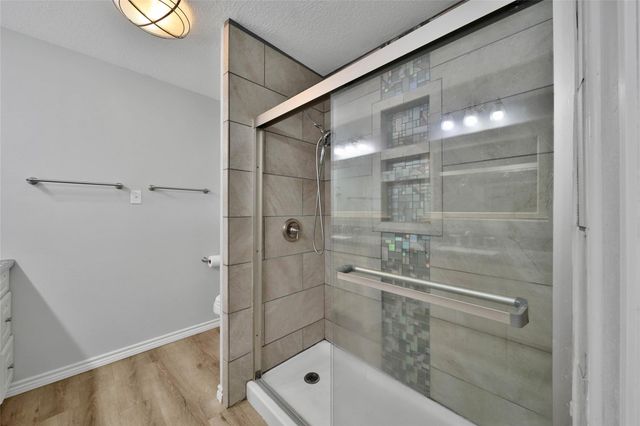 9898 Twin Shores Drive, Willis, TX 77318