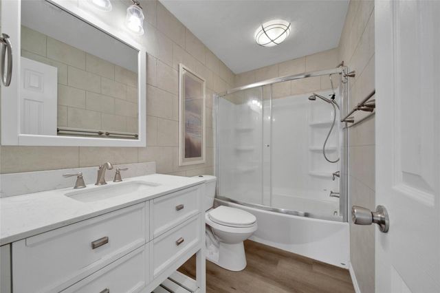 9898 Twin Shores Drive, Willis, TX 77318