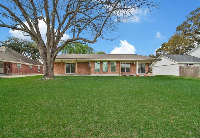 9898 Twin Shores Drive, Willis, TX 77318