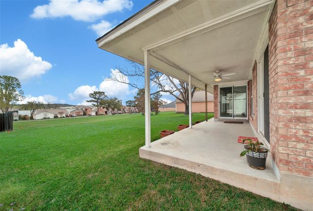 9898 Twin Shores Drive, Willis, TX 77318